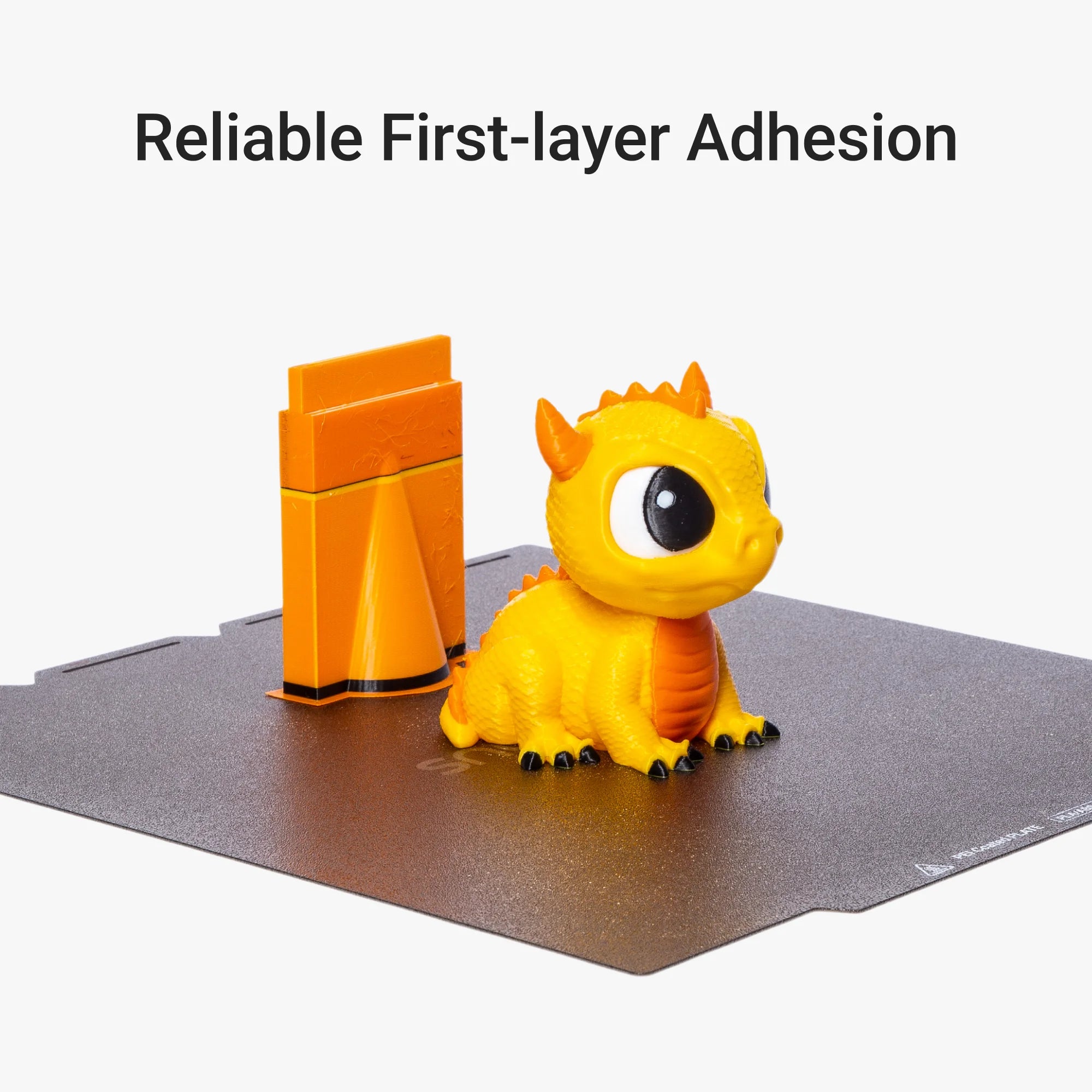 Textured PEI Steel Plate for Snapmaker U1 holding a yellow dragon model with reliable adhesion.
